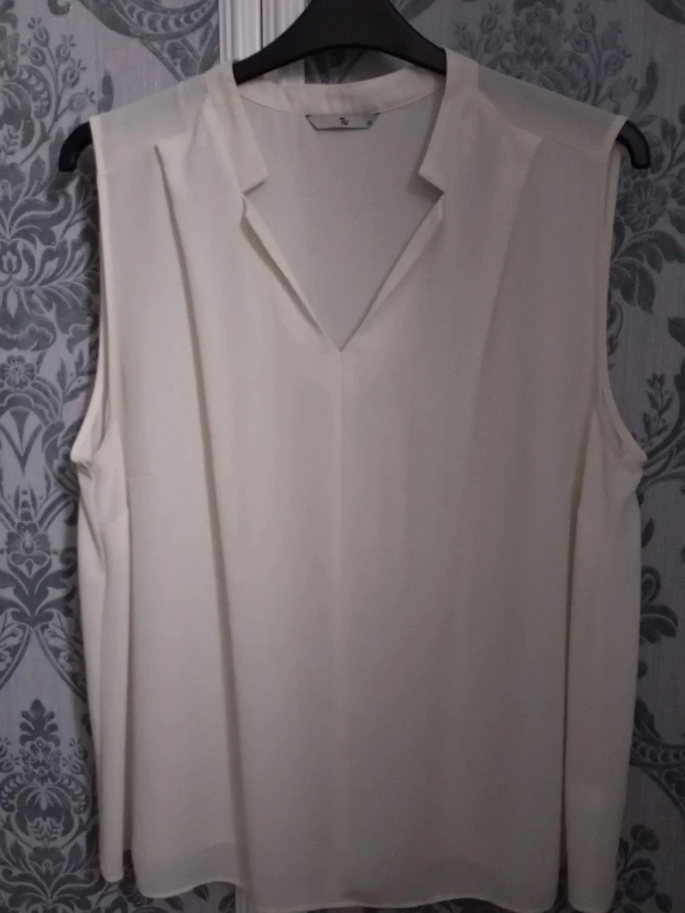 Sleeveless V-Neck Cream Blouse